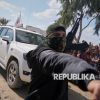 Trump Ancam Lucuti Paksa Senjata Hamas